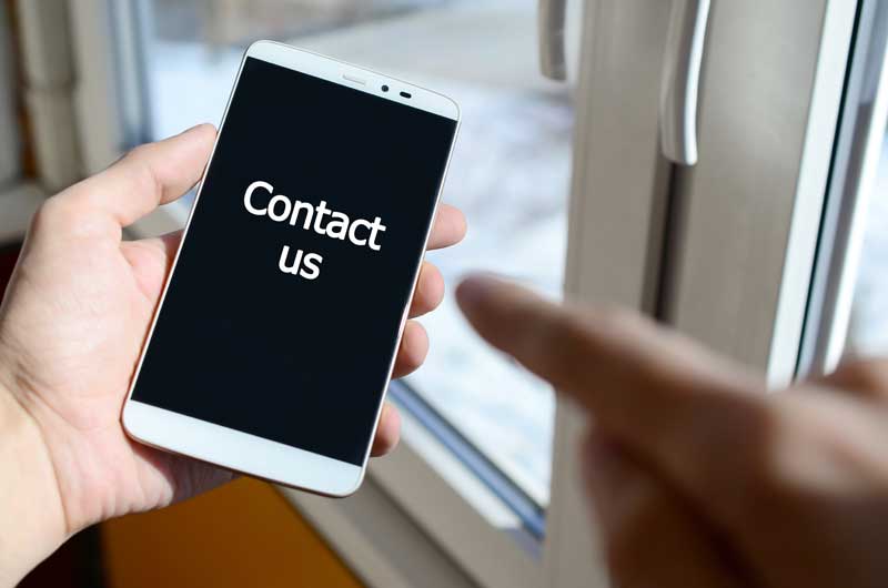 contact-us-text-on-white-phone